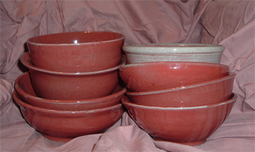 thrown bowls with red glaze