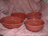thrown bowls in red glaze